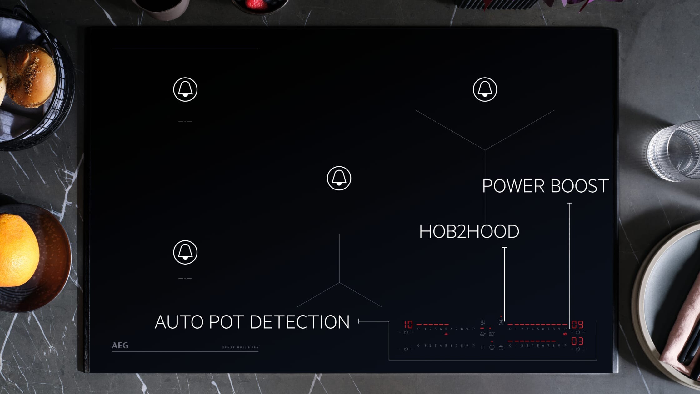 Différentes fonctions affichées sur une taque de cuisson à induction.